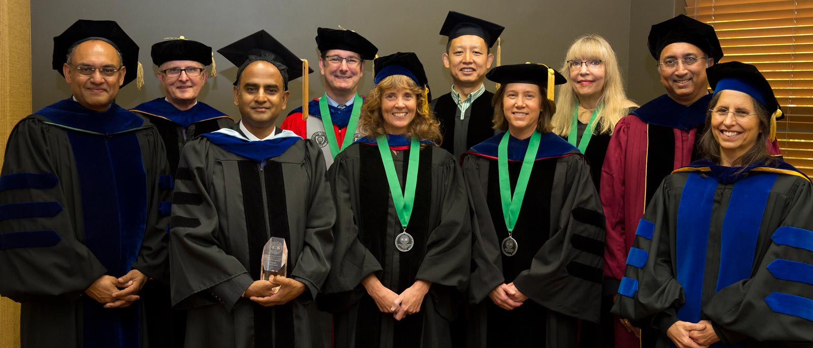 Group photo from Broad faculty investiture ceremony held at the Kellogg Center.