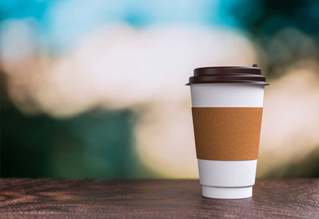 coffee takeaway on the table - bokeh background - 3d illustration rendering