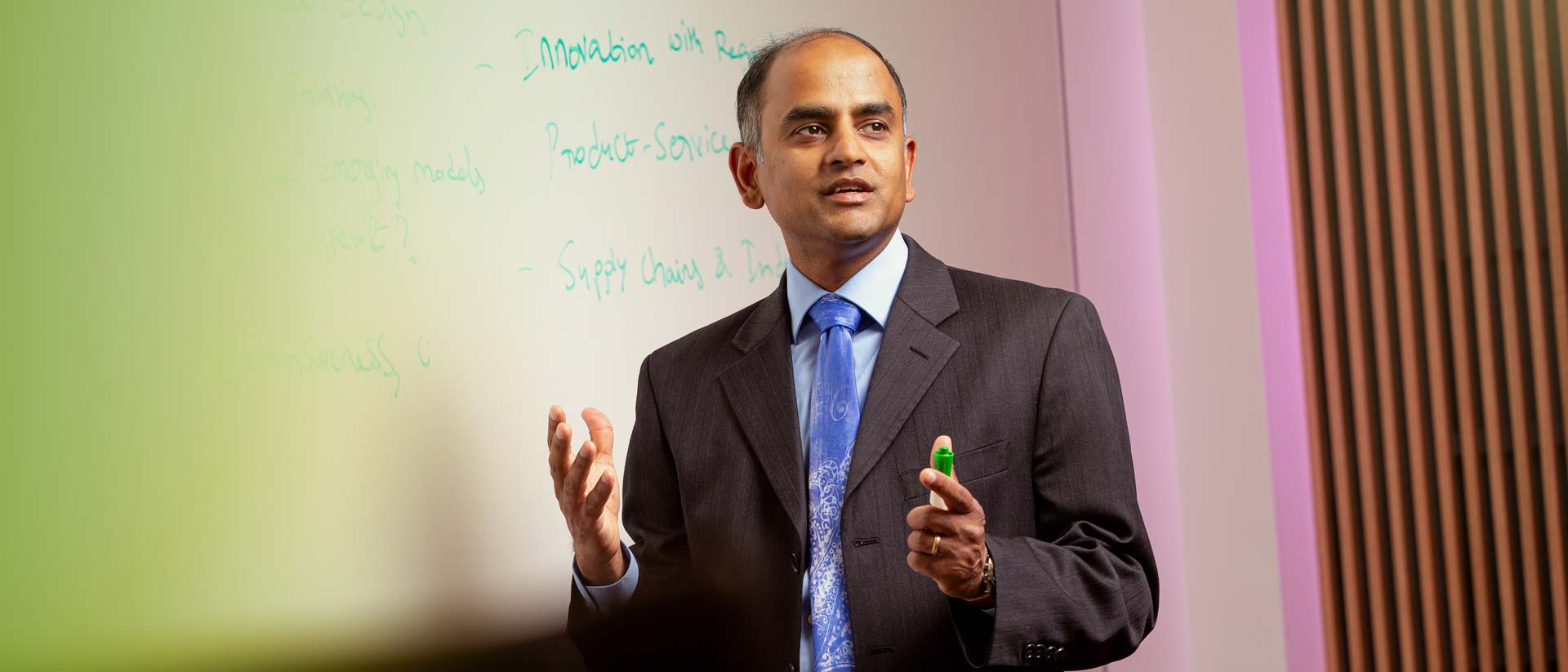 Professor in Supply Chain Management Sriram Narayanan teaches in a classroom inside the Edward J. Minskoff Pavilion