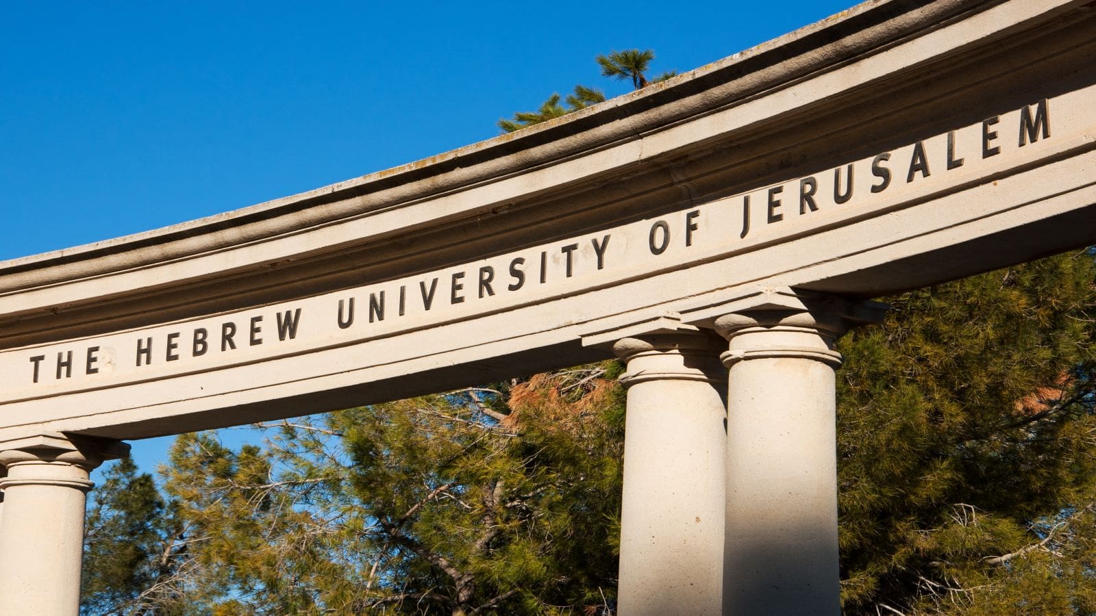 The Hebrew University of Jerusalem sign on the arch of the amphitheater at Mount Scopus (Har Ha-Tzofim) campus.