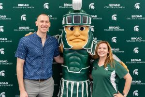 Broad College staff pose for a picture with Sparty.