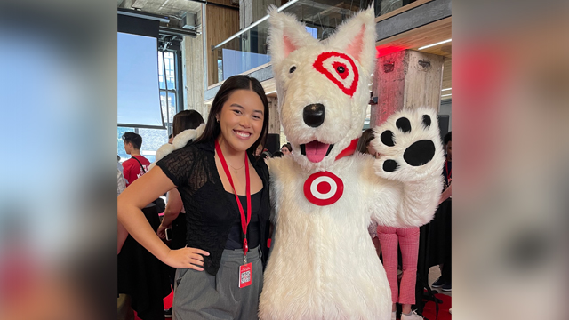 Vivian Tran and Target mascot posing for camera