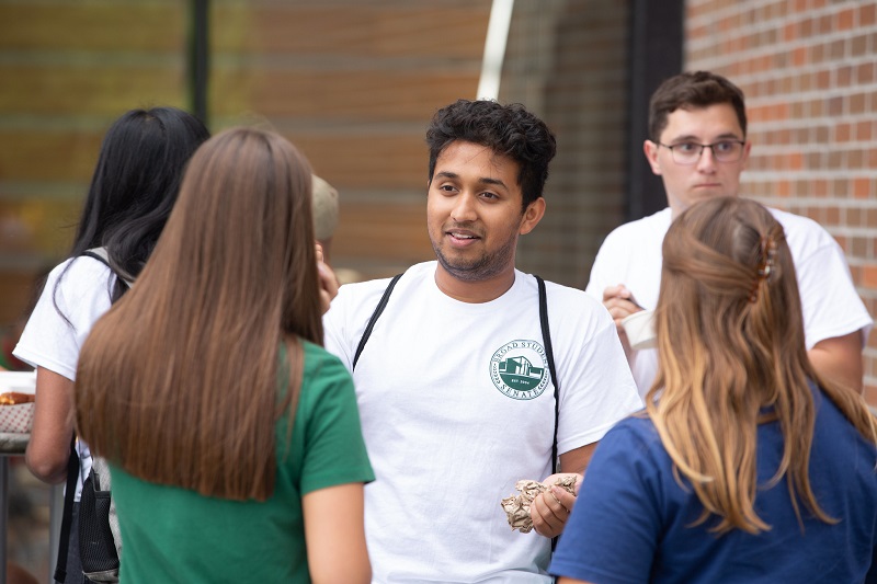 Students talking at Broad Fall Welcome events.