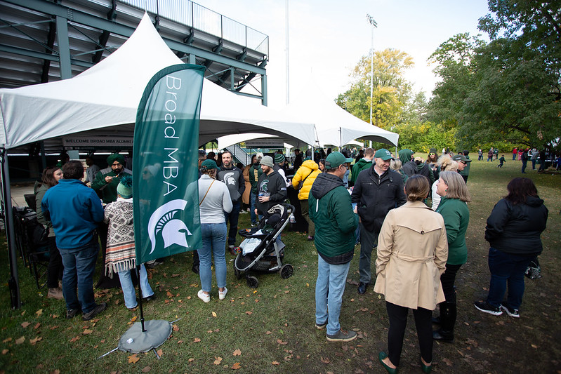 Crowd of Broad College alumni, students, staff at the 2022 MBA Homecoming tailgate.