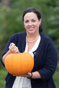 Amy Ghannam holding a pumpkin