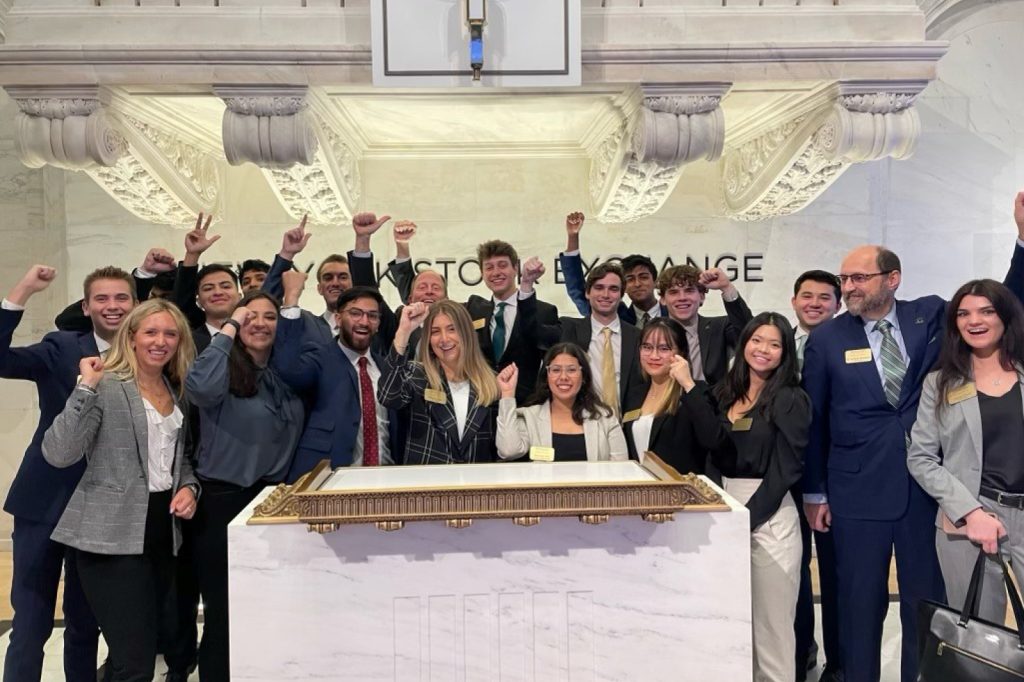 A group of Broad students and faculty at the New York Stock Exchange in 2022.