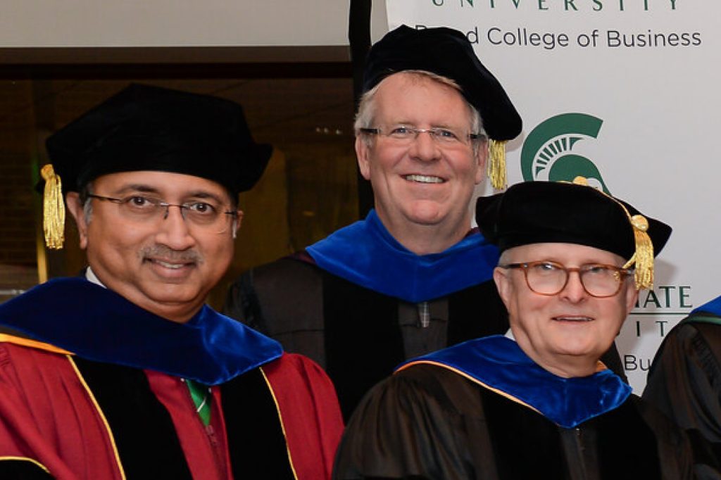 Vallabh Sambamurthy, Don Conlon and Bob Wiseman in academic regalia.