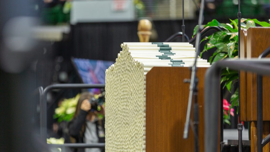 A stack of diplomas at MSU commencement.