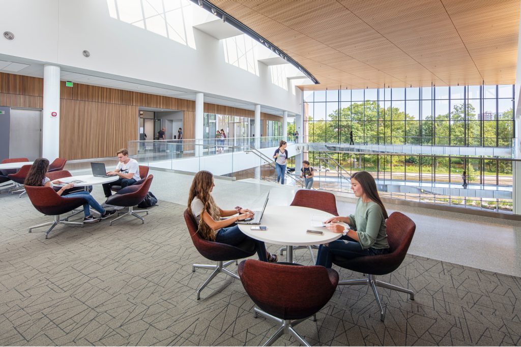 Students sit at tables and work together in the Broad College's Minskoff Pavilion.