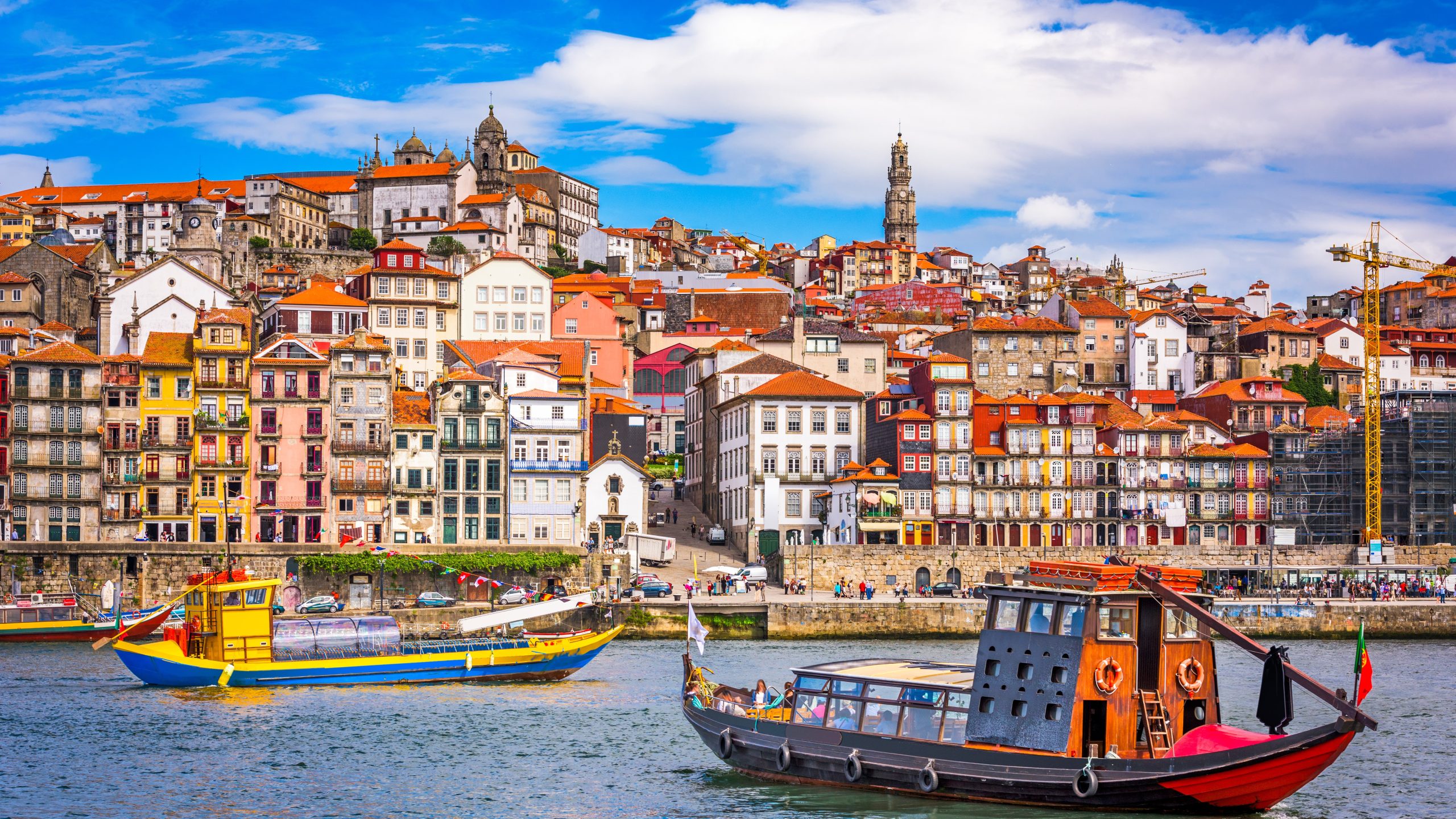 Porto, Portugal old town skyline from across the Douro River.