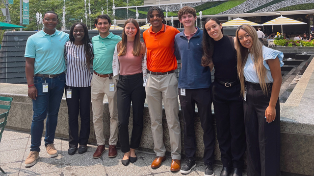 Amanda Nguyen taking a group photo with other interns at EY