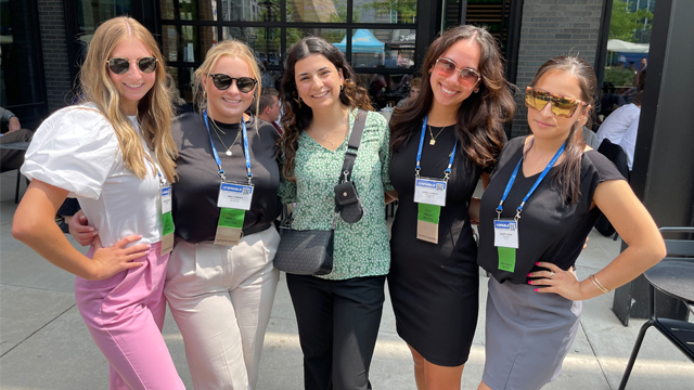 Dina Younes posing with other interns