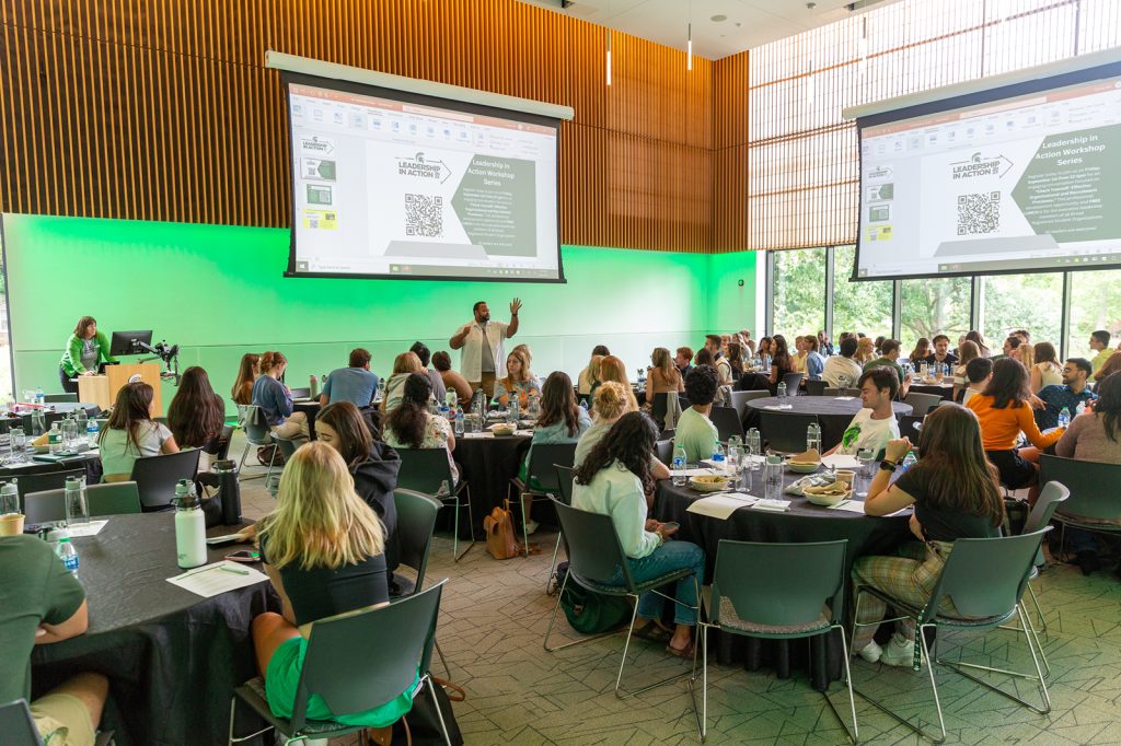 Minskoff Pavilion room filled with students listening to a presentation at the Leadership in Action kickoff summit.