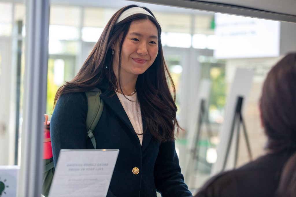 A Spartan attends a career fair networking event.