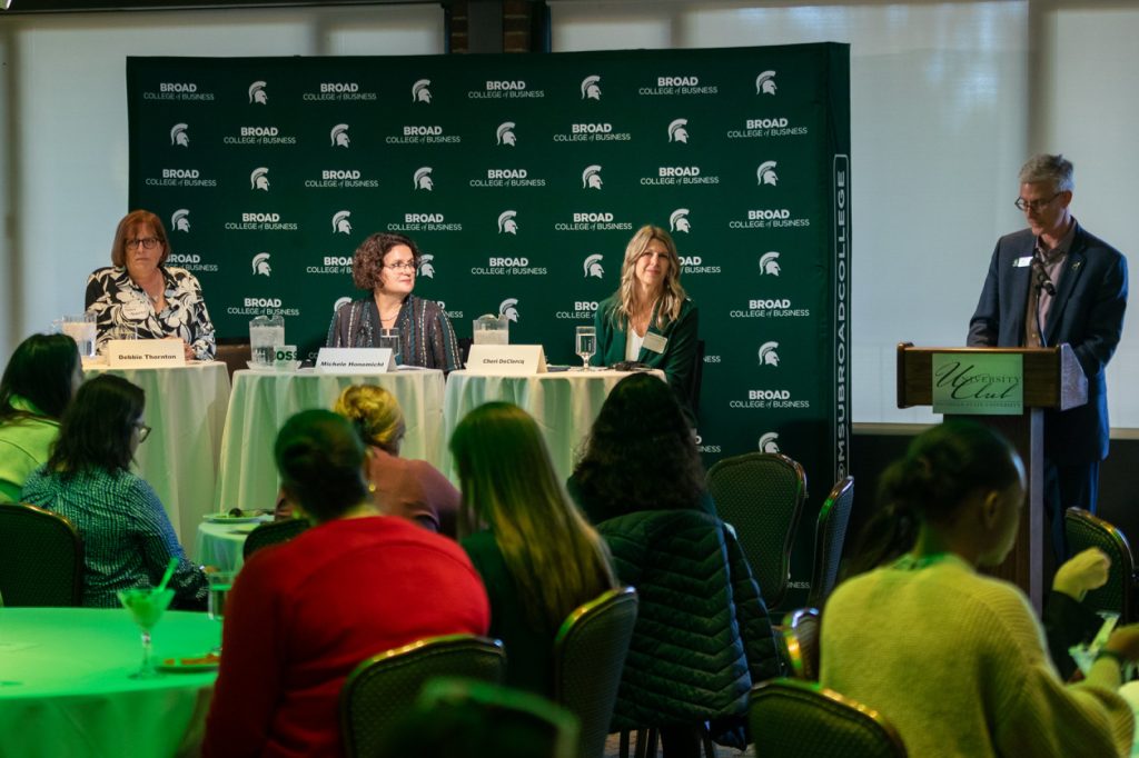 Panelists speaking at Women In Business event