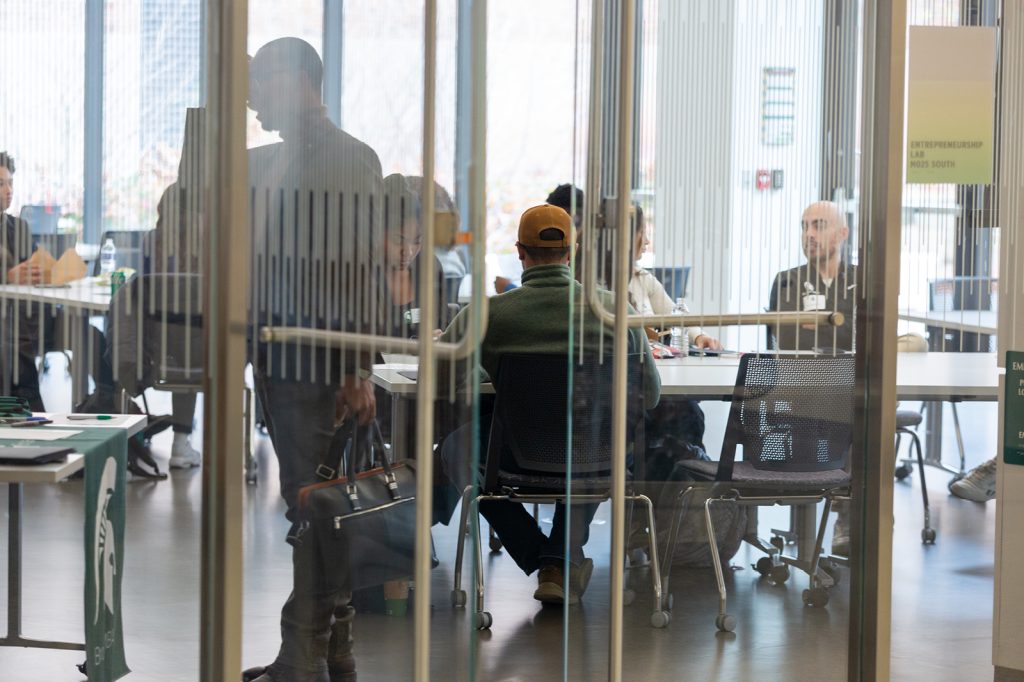 Roundtable participants sitting in conference room