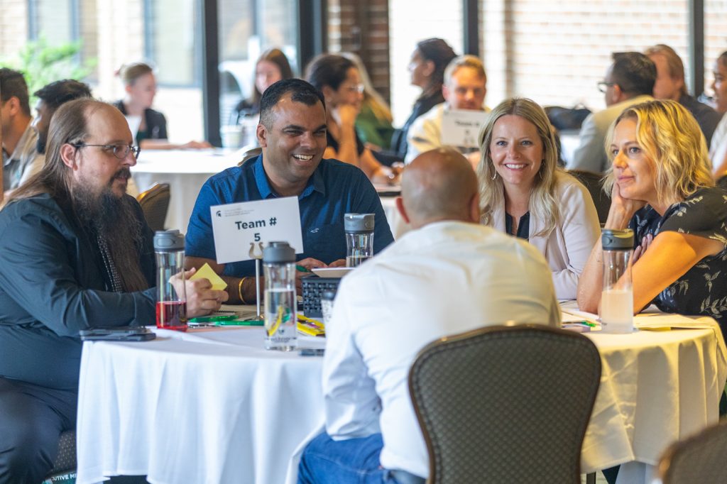 Group of MBA students networking at the 2026 Cohort kickoff