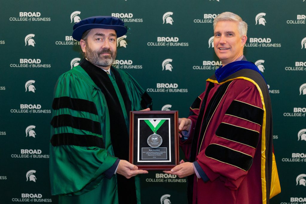 David Souder and Ryan Israelsen holding award plaque
