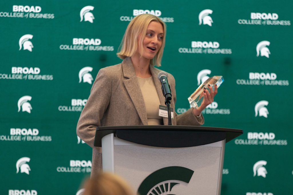 Ariana Ferwerda giving a speech and Michigan State