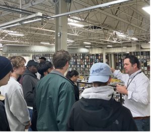 Tour guide speaking to group