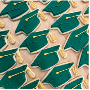 Sugar cookies shaped like graduation caps