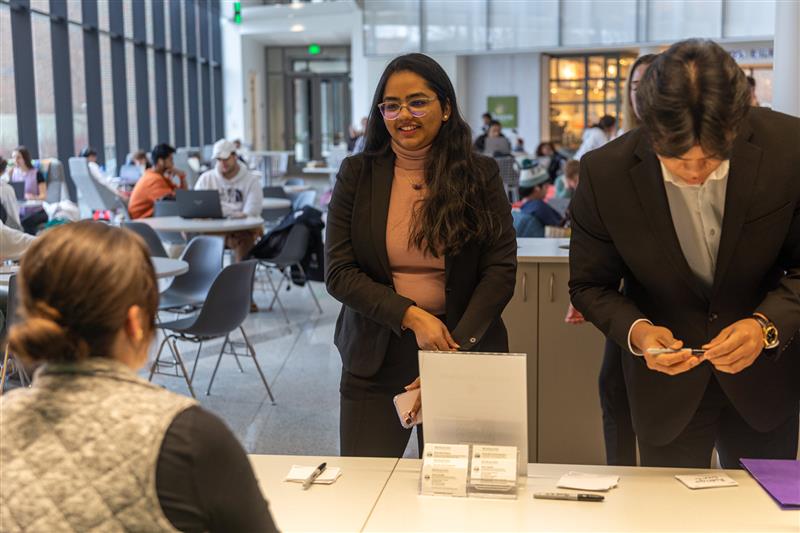 Students checking in at the event