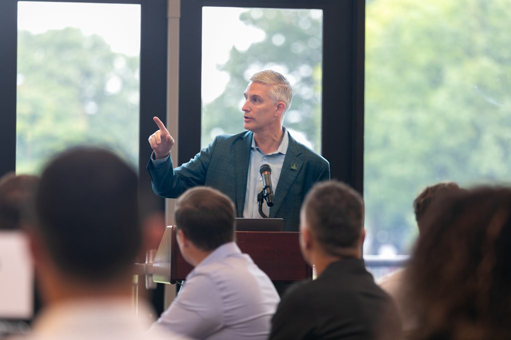 Dean Souder speaking to EMBA students