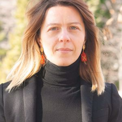 A professional headshot of Vincenzina Caputo