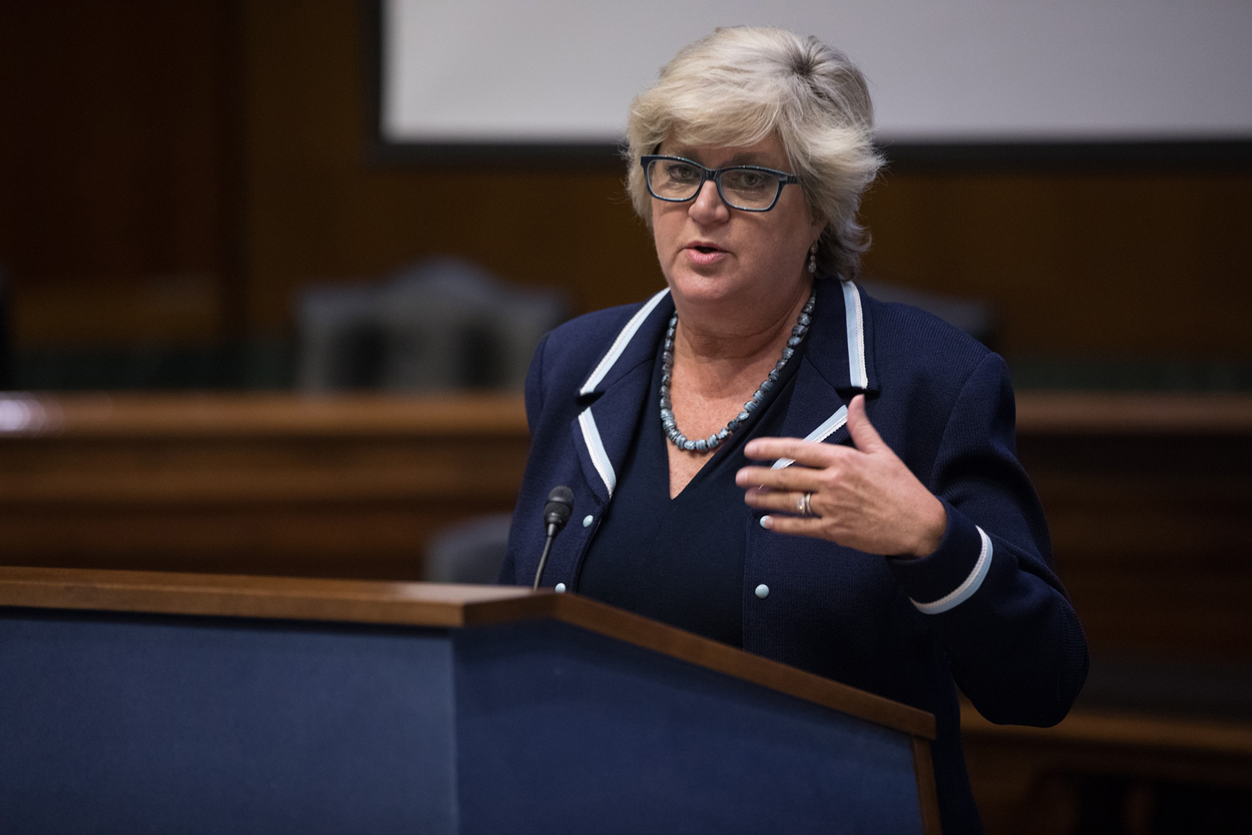 Sherron Watkins speaking at a podium