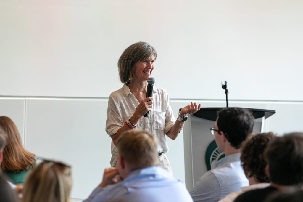 Molly Barker speaking to event attendees