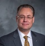 Person in suit and tie