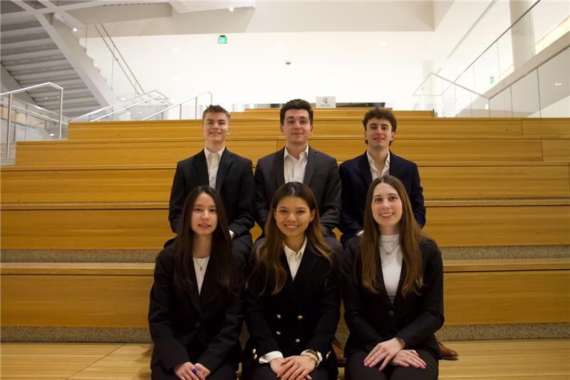 Students sitting on the Minksoff steps