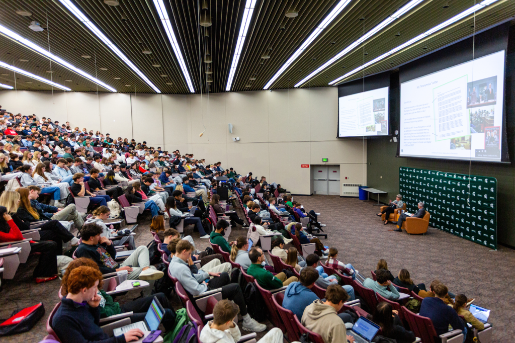 Auditorium filled with people