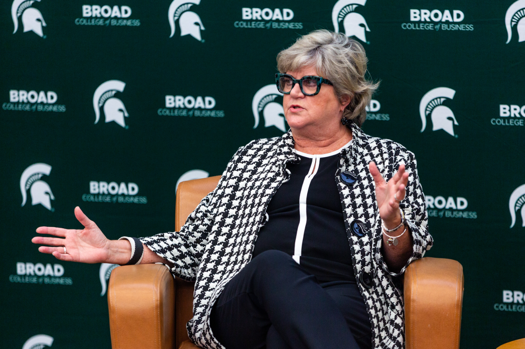 Person sitting in chair speaking