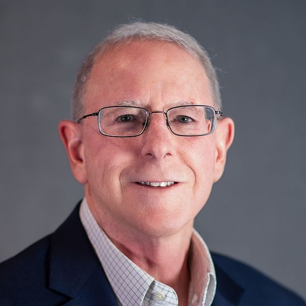 Professional headshot of Paul Balas