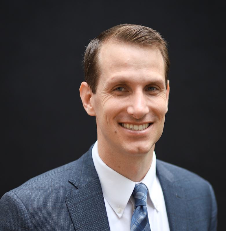 Professional headshot of Ken Bills