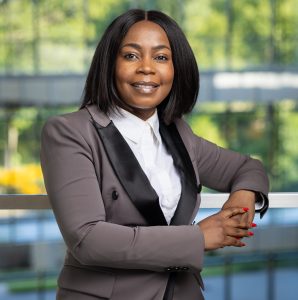 haedshot of a black woman with short black hair wearing a business suit.