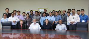 Analytics intensive program students pose with faculty from MSU and S. P. Jain.