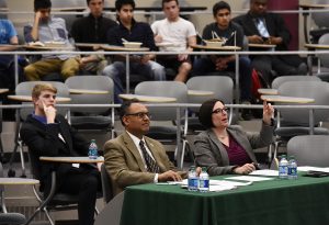 Dean of the Broad College of Business Sanjay Gupta and President of MSU Federal Credit Union April Clobes judge the Financial Literacy competition.