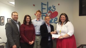 Students donate check to Ele's Place