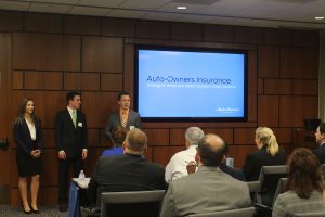 Students presenting at Auto-Owners.