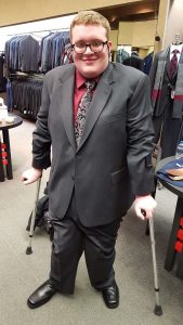 Scott in a business suit.