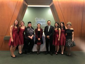 Deans Sanjay Gupta and Kathy Petroni join Bonnie Knutson and Les Gourmets executive board members at the sixty-first annual event.