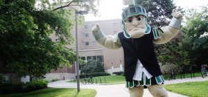 Sparty in a business jacket