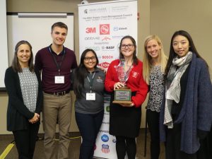 Kathy Petroini with the winners of the competition from the University of Wisconsin.