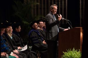 Ray Scott, president of Lear Corporation, presents the commencement address