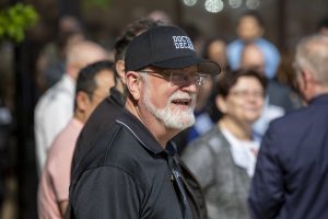 Brian Pentland, faculty director of the MSU Center for Business and Social Analytics, watches a driverless car demonstration during the Workshop on Autonomous Vehicles in Society in mid-May. Photo by Jeff Seguin