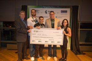 From left to right: MSUFCU’s Jeff Jackson; Josiah Price; Joe Johnson; Paul Jaques of Spartan Innovations; and Megan Johnson at the 2017 GreenLight Business Model Competition. Photo courtesy John McGraw Photography
