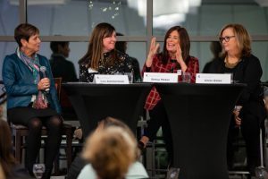 The Advancing Women in Business moderator and panelists (from left): Julie Fasone Holder, Lea Ammerman, Betsy Meter, and Chris Oster engage the audience at the Kellogg Hotel & Conference Center on Nov. 14. Photo by Kasra Raffi