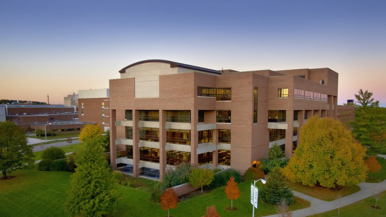 Aerial photo of the exterior of the MSU College of Law building, which houses the Gast Business Library.